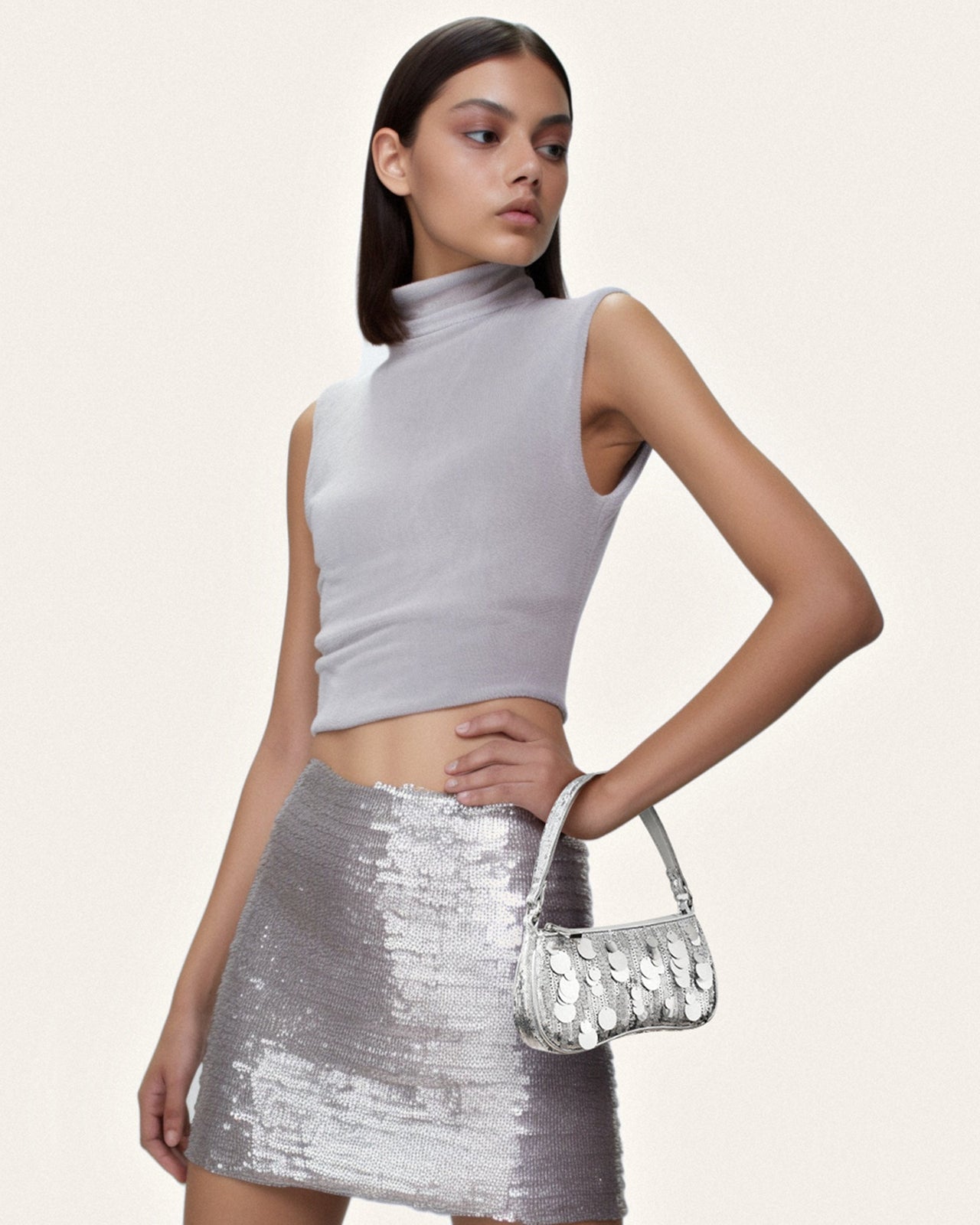 La borsa a tracolla mini in paillettes metalliche Eva - Argento